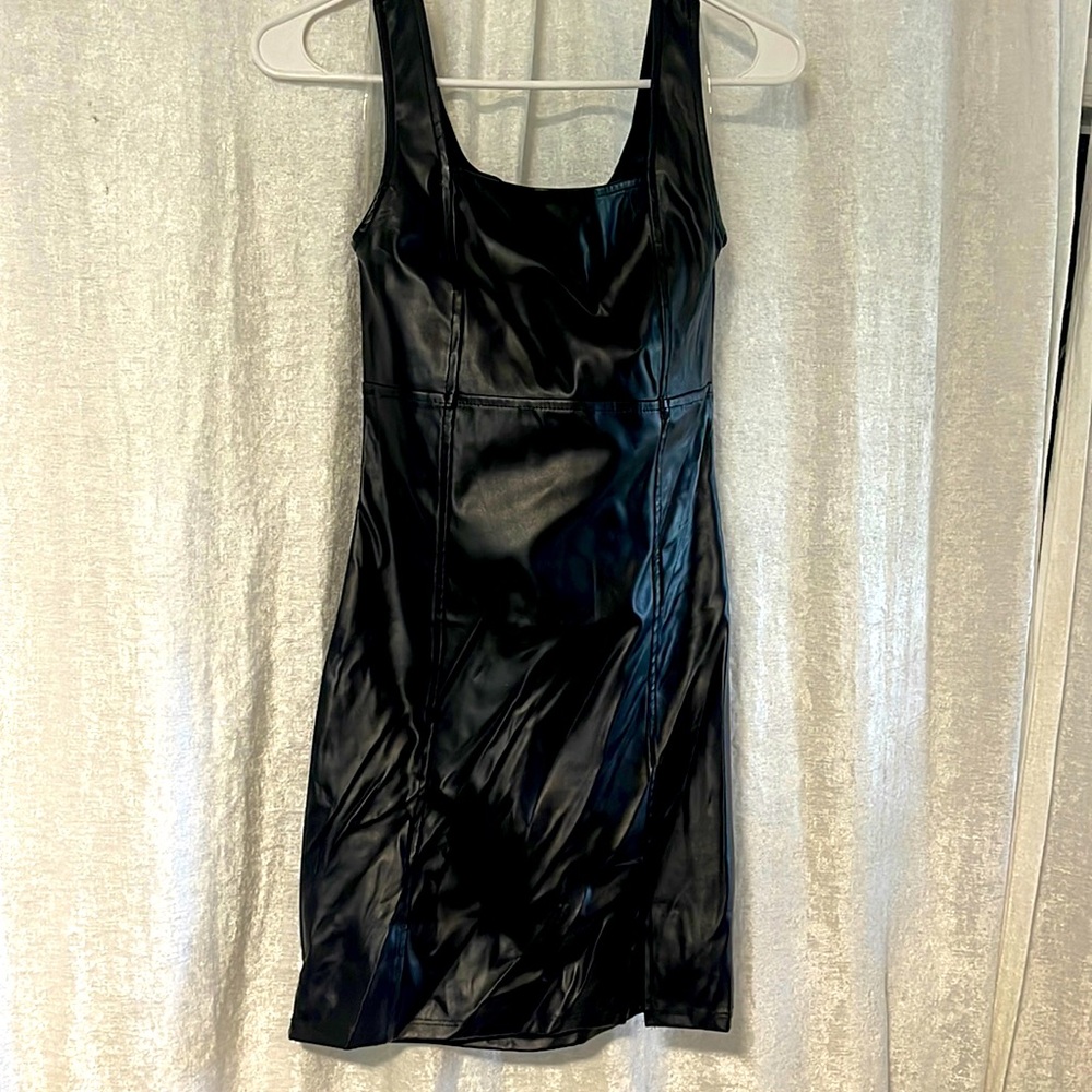 Black faux leather mini dress with small slit